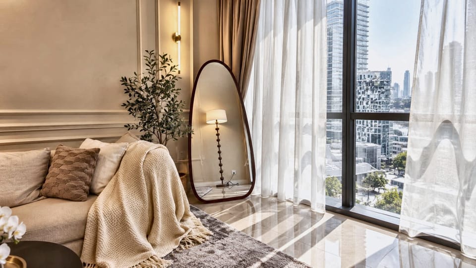 Living area beside floor-to-ceiling glazing